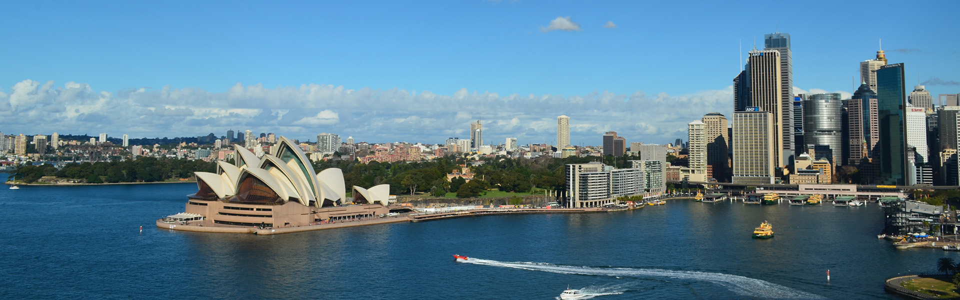 city-waterfront-against-cloudy-sky